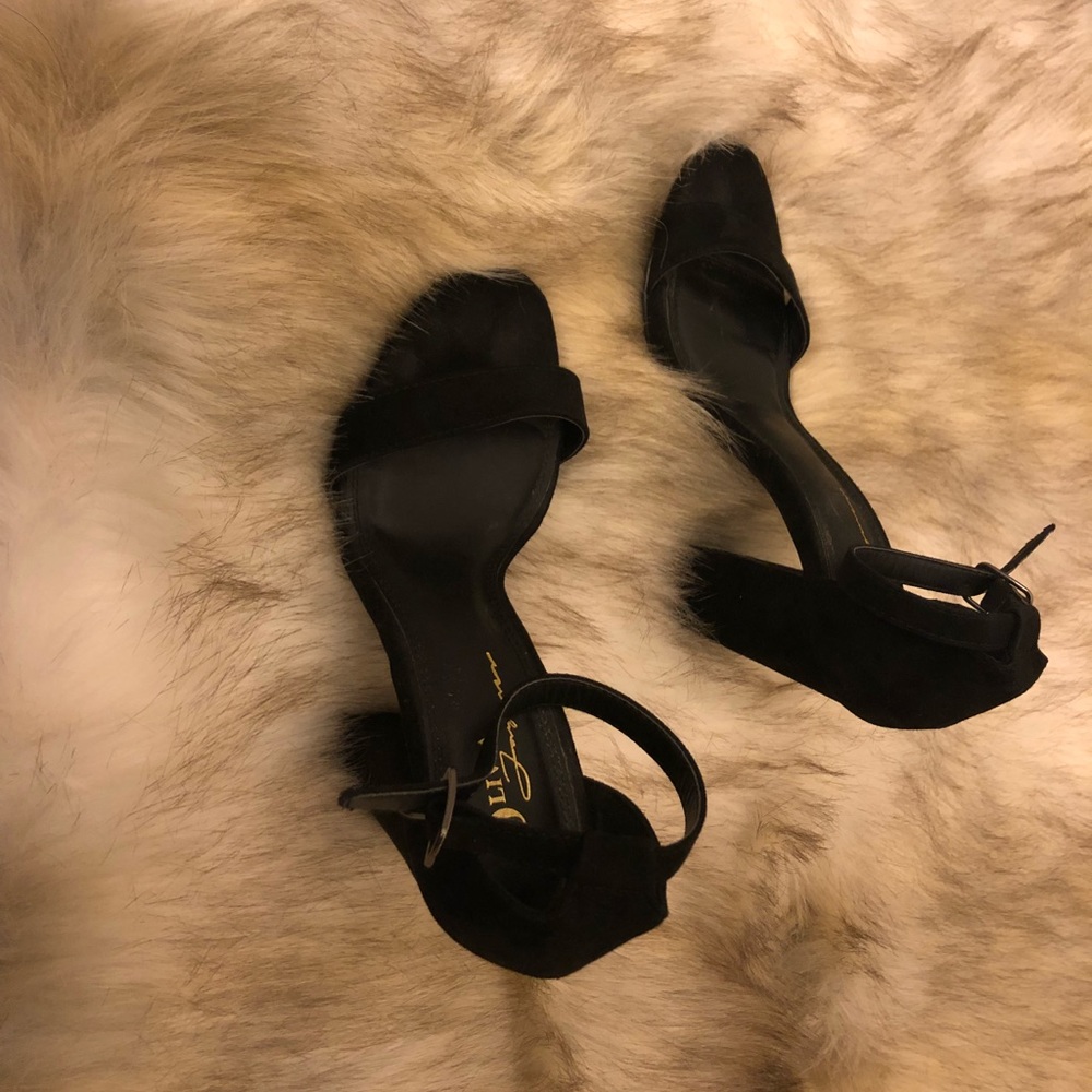 Strapped black heels